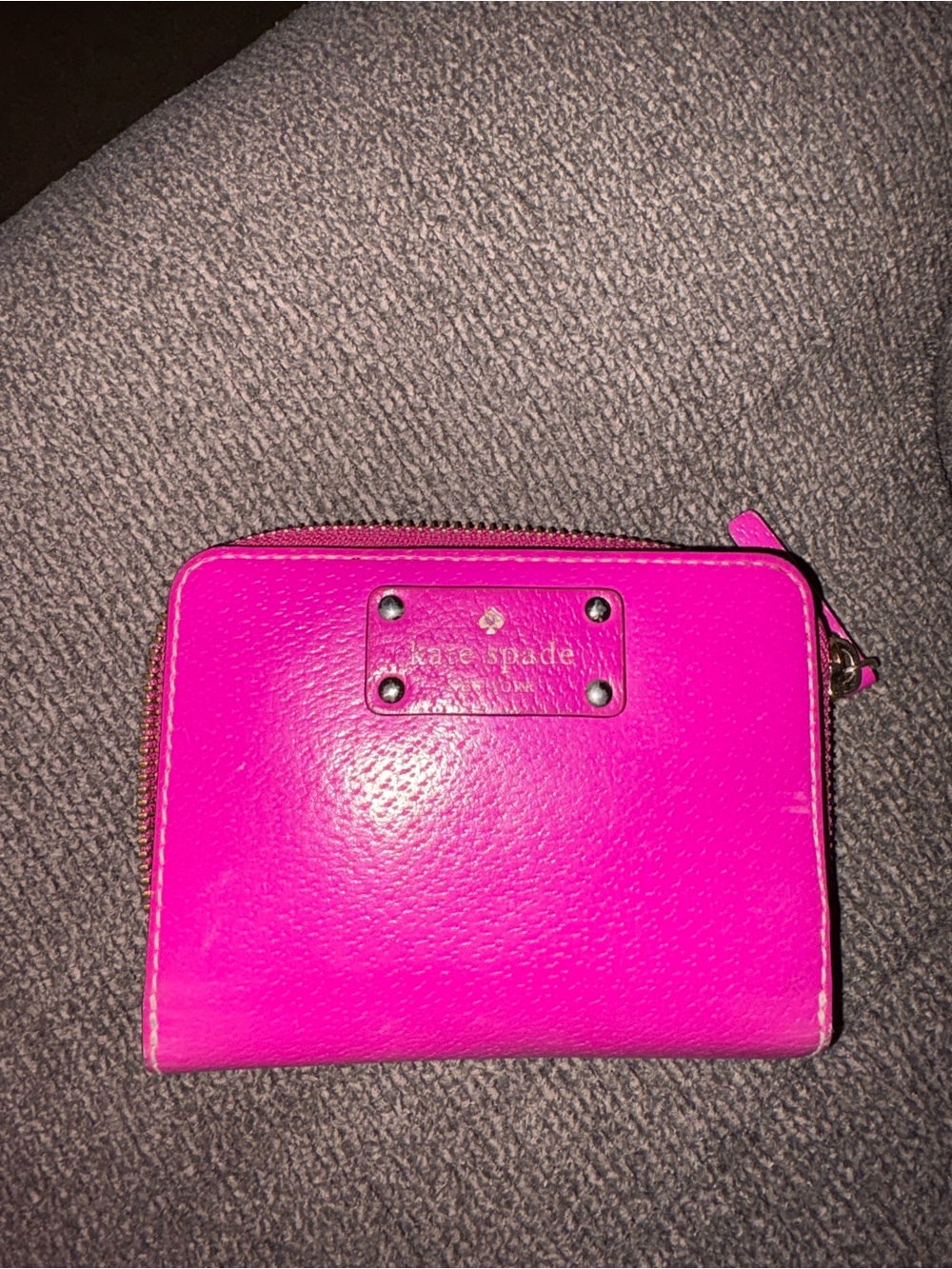 kate spade magenta pink pebble leather zip-around wallet